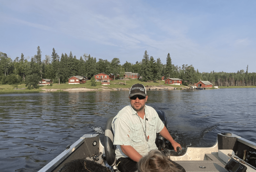 Man Riding A Boat