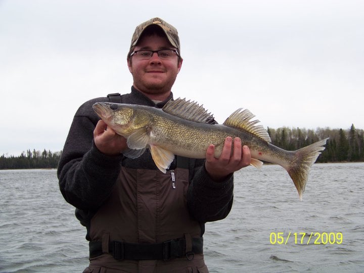 Man Holding Giant Fish