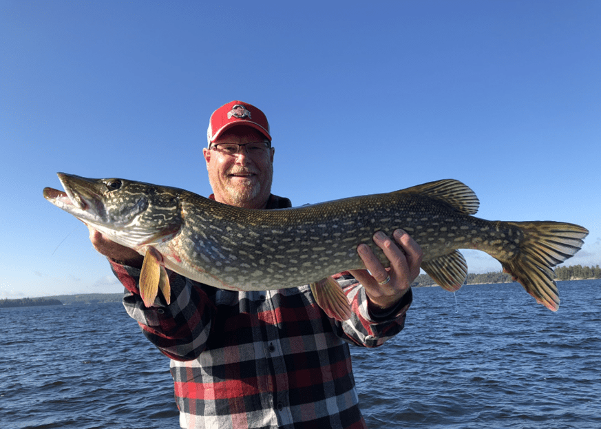 Man Showing The Fish He Caught